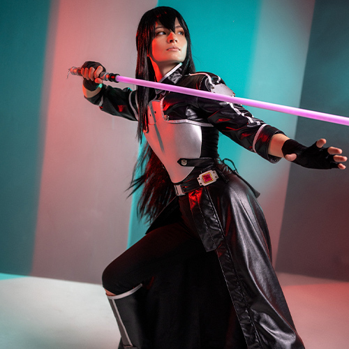 Impressive Kirito cosplay from Sword Art Online: Gun Gale Online (GGO), featuring the iconic black and white armor, long coat, and vibrant pink photon sword in a dramatic battle-ready stance. Perfect for fans of Kirito and Sword Art Online cosplay inspiration