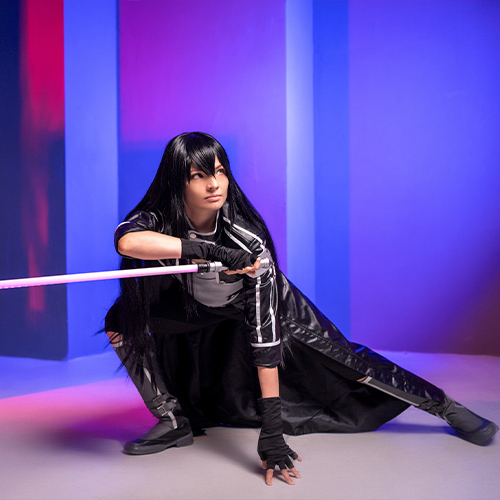 Impressive Kirito cosplay from Sword Art Online: Gun Gale Online (GGO), featuring the character in a crouched battle stance with his iconic pink photon sword glowing against a vibrant background. Perfect for fans looking for Kirito cosplay ideas or Sword Art Online inspiration