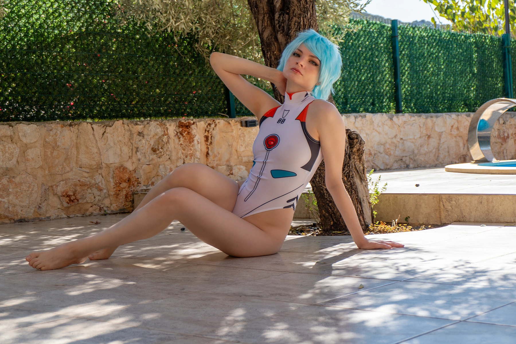 Rei Ayanami cosplay relaxed seated extended legs clean lines white plugsuit minimalism airy Evangelion lifestyle